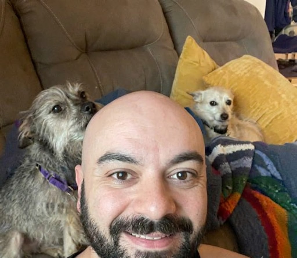 Steven with his dogs John and Lucy.